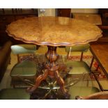 A Victorian walnut oval occasional table having shaped top, 82cm