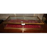 A Victorian brass framed table top display case, a.f., width 68cm, depth 34.5cm, height 12cm