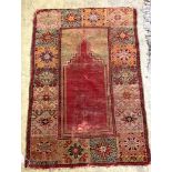 A Caucasian red ground prayer rug, 121 x 82cm