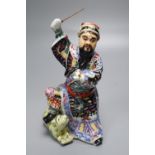 A mid 20th century Chinese famille rose figure of an immortal, height 15cm