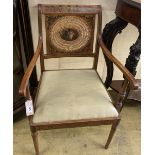 An Edwardian Sheraton revival painted satinwood elbow chair, width 56cm