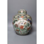 A Chinese famille verte jar and cover, Kangxi mark, 19th century, height 29cm