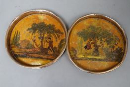A pair of Continental japanned coasters, diameter 13cm
