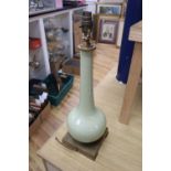 A French duck egg blue porcelain bottle neck vase converted to a table lamp, brass plinth, c.1970,