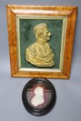 A maple framed ormolu relief of the Duke of Wellington and a plaster relief of Nelson, latter height