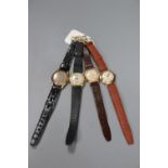 Four assorted gentleman's mid 20th century 9ct gold manual wind wrist watches, including Tavannes,