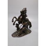 After Cousteau. A small bronze Marli horse group, height 19cm