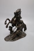 After Cousteau. A small bronze Marli horse group, height 19cm