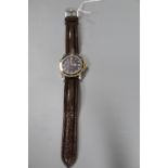 A gentleman's steel Girard Perregaux Sea-Hawk automatic wrist watch, on lizard strap, case