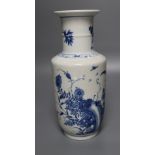 A Chinese blue and white vase, in underglaze blue decorated with butterflies, height 23cm