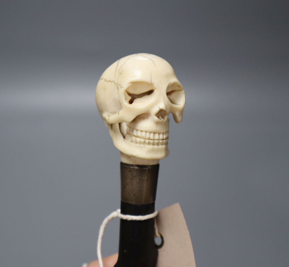 A Victorian ebonised walking cane with ivory skull hand-piece, length 87cm - Image 2 of 2