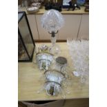 A cut glass table lamp, height 44cm and a pair of lustre wall lights