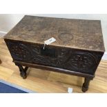 An 18th century oak bible box on associated stand, width 62cm, depth 34cm, height 49cm