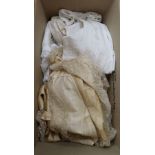 A cream silk and lace christening cape together with a collection of baby and childrens clothing