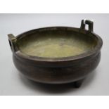 A Chinese bronze shallow tripod censer, Qianlong mark, late Qing, diameter 15cm, together with a