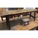 A 19th century oak bench and a small beech and elm stool, larger width 114cm, depth 27cm, height