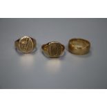 Three assorted 9ct gold rings including a wedding band, gross 24.1 grams.