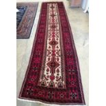 A Belouchi rug, 390 x 96cm
