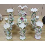 Eight English porcelain floral encrusted vases and a Coalbrookdale type two-handled jar and cover,