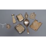 Small silver including two vesta cases, 19th century caddy spoon, seal, miniature scent flask,