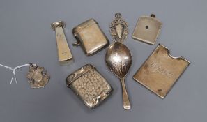 Small silver including two vesta cases, 19th century caddy spoon, seal, miniature scent flask,