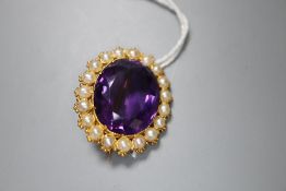 A yellow metal, amethyst and split pearl set oval brooch, 28mm, gross 7 grams.CONDITION: No