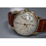 A gentleman's 1950's? 18k Titus manual wind chronograph wrist watch, on later strap, case diameter