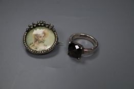 A sterling and seed pearl set portrait brooch, 25mm and a Thomas Sabo 925 ring.