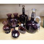 A group of 19th/20th century amethyst glass including a pair of decanters, height 22cm and six