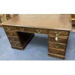 A 20th century Georgian style mahogany pedestal desk, width 152cm, depth 83cm, height 76cm