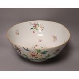 An 18th century Chinese porcelain punch bowl, brightly painted in enamels, 30cm