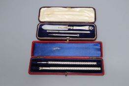 A cased late Victorian silver spiral decorated pen and a similar sterling pencil, 15.2cm and a cased