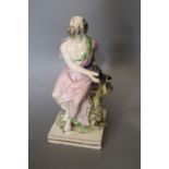 An early 19th century pearlware figure of a saint, height 25cm