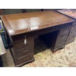 A mahogany pedestal desk fitted brown skiver, width 124cm, depth 70cm, height 75cm