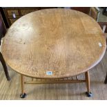 An Ercol light elm and beech oval coffee table, width 99cm, depth 82cm, height 45cm