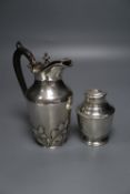 A George V silver tea caddy by George Unite & Sons, 10.7cm and a silver water jug, gross 14 oz.