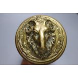 A 19th century brass ram's mask door handle, depth 18cm