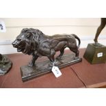 Barye. A bronze lion, width 36cm height 22cm