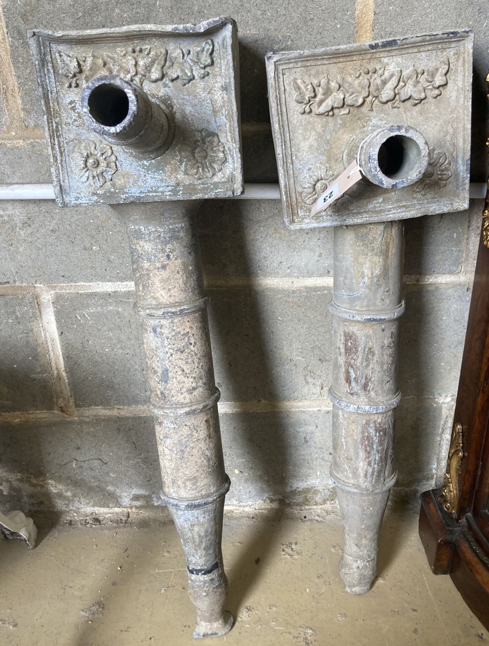 A pair of Georgian lead rain water hoppers, height 84cm