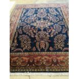 An Indian Tabriz blue carpet, 300 x 250cm