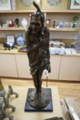 A bronze of Mephistopheles, height 82cm