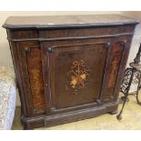 A 19th century French marquetry inlaid amboyna breakfront side cabinet, width 114cm, depth 40cm,