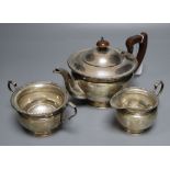 A George V silver three-piece tea service, by Harrod's Ltd, Birmingham, 1932, gross 20.5 oz.