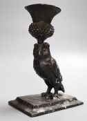 A bronze owl candlestick, signed Barries, height 14cm