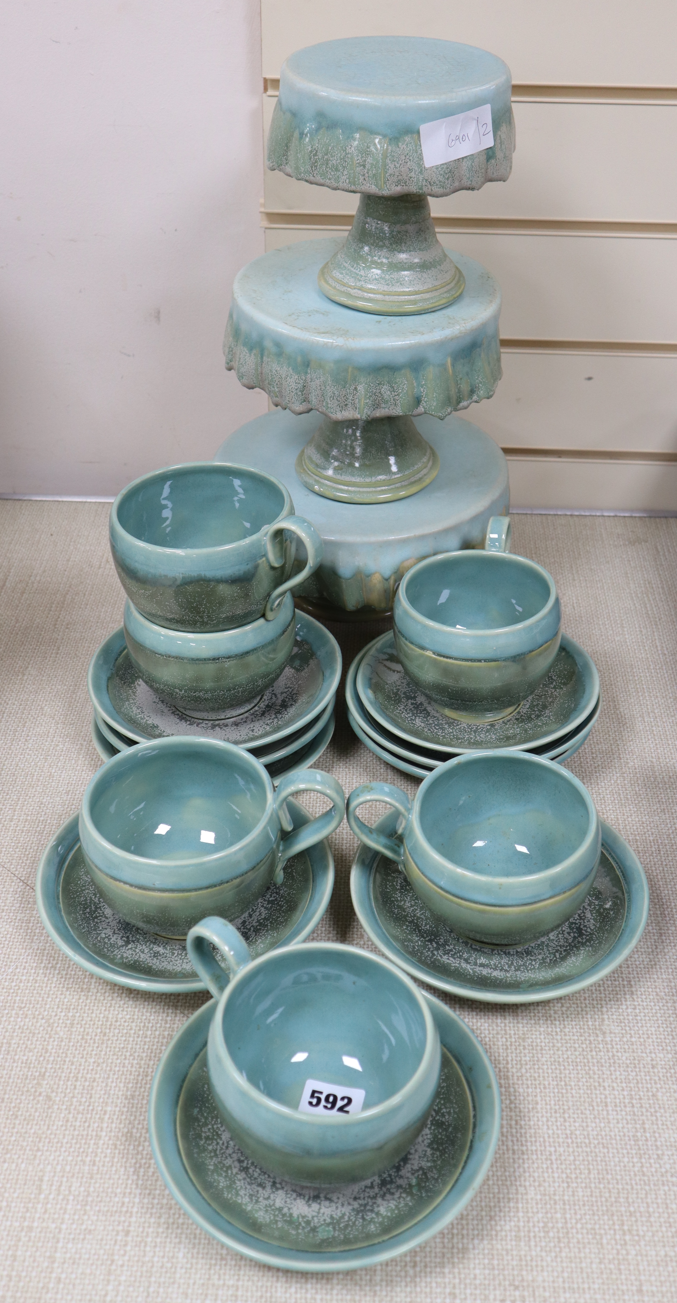 Francis Doherty (Brighton Ceramicist). A glazed cake stand and six cups and saucers