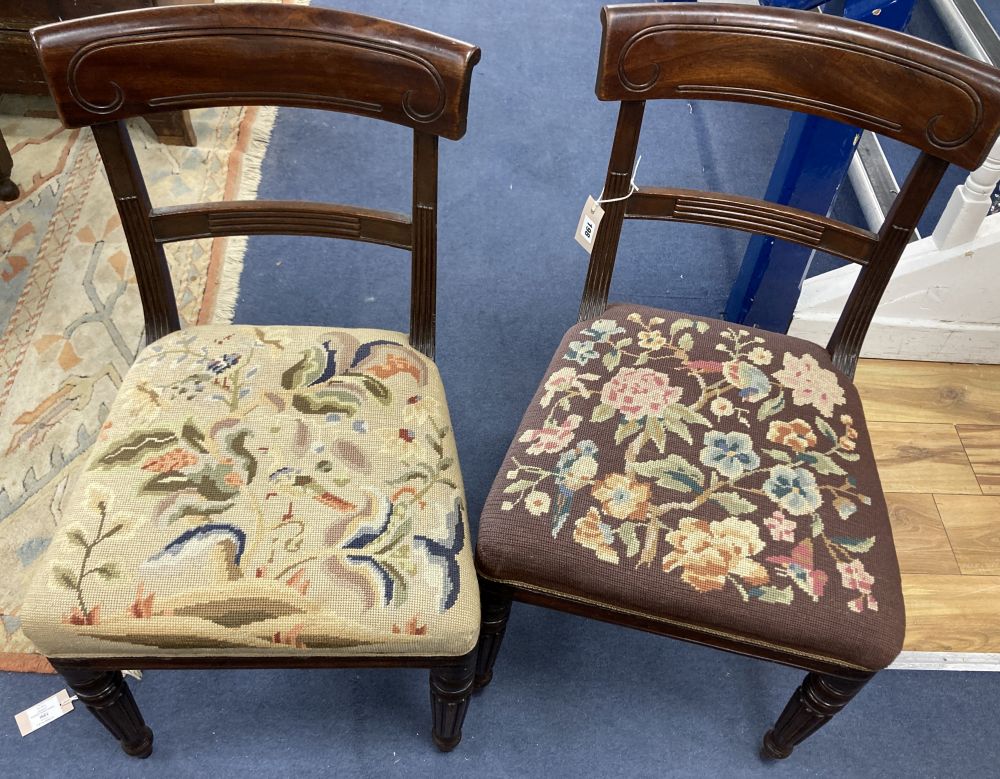 A set of eight William IV mahogany dining chairs, on turned fluted legs