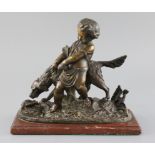 Auguste Joseph Peiffer (French, 1832-1886). A bronze group of a putto with a setter, standing upon