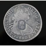 A rare George III octagonal countermarked silver dollar, crisp countermark on a fairly worn 8 Reales