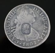 A rare George III octagonal countermarked silver dollar, crisp countermark on a fairly worn 8 Reales