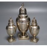 A suite of three late Victorian silver pepperettes by George Fox, London, 1899/1900, tallest 17cm,